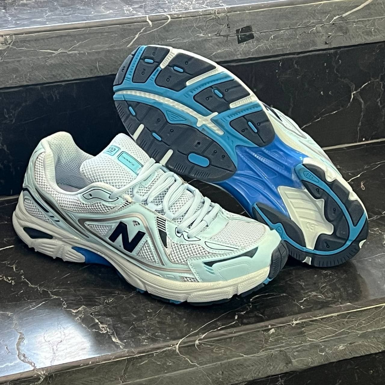 کفش کتانی مردانه بزرگ پا نیوبالانس 1064 آبی تمام 1064 New Balance